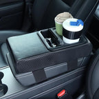 Supin Car Armrest Cushion - Multifunctional Faux Leather Armrest Cushion with Cup Holder, Phone Storage, and Ergonomic Design for All Seasons (Carbon Style)