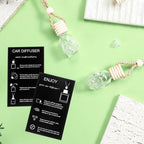 Boao 50 Sets Halloween Skull Hanging Car Air Freshener Diffuser Bottles with 2 x 3.54 Inch Car Diffuser Instructions Cards for Empty Essential Oil Bottles(Black Card,Skull)