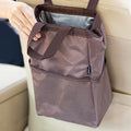 Ginsco New Leak-Proof Travel Trash Bag, Hanging Car Trash Can with Hook and Loop Lid and Handle, Multipurpose Trash Bin with Storage Pockets for Car SUV Truck RV Camping 2 Gallons (Brown)