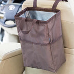 Ginsco New Leak-Proof Travel Car Trash Bag, 3.5 Gallons Large Capacity Hanging Car Trash Can with Hook and Loop Lid and Handle, Multipurpose Trash Bin with Storage Pockets for SUV RV Camping (Brown)